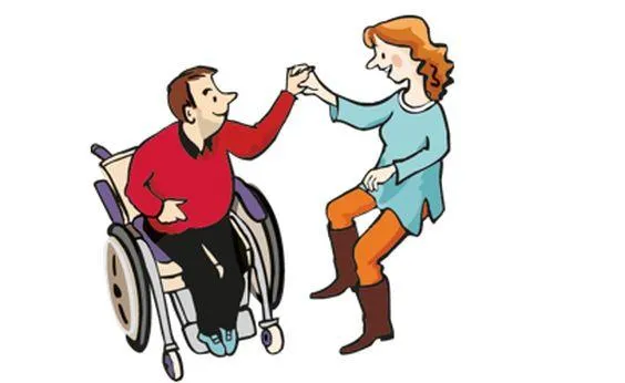 Eine Frau und ein Mann im Rollstuhl tanzen miteinander.