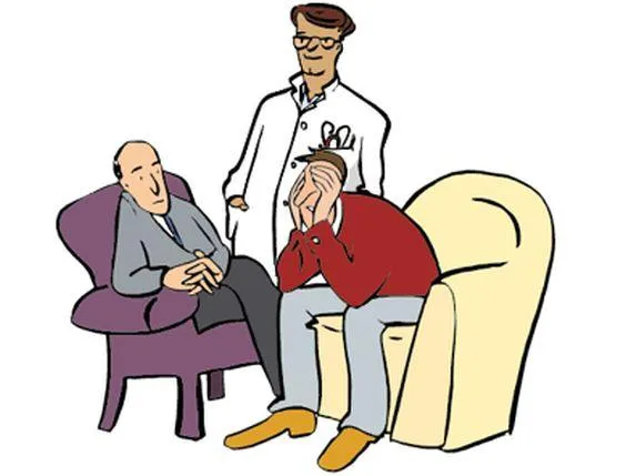 Ein Arzt und ein Psychtherapeut sprechen mit einem Mann.