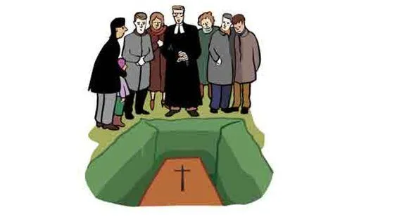 Mehrere Menschen stehen an einem Grab.