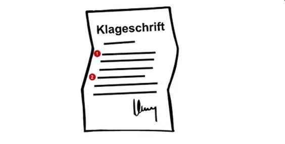 Ein Blatt auf dem "Klageschrift" steht.