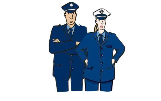 Ein Polizist und eine Polizistin stehen nebeneinander.