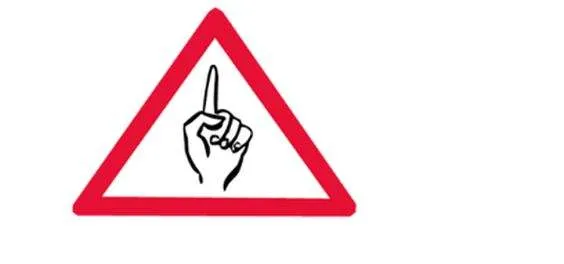 Eine Hand mit erhobenem Zeigefinger in einem Achtung-Schild.