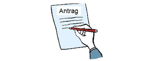 Eine Hand schreibt auf ein Blatt Papier, darauf steht "Antrag".